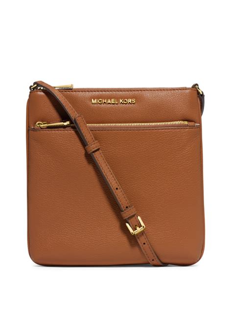 michael kors crossbody bag brown thomas|Michael Kors brown leather backpack.